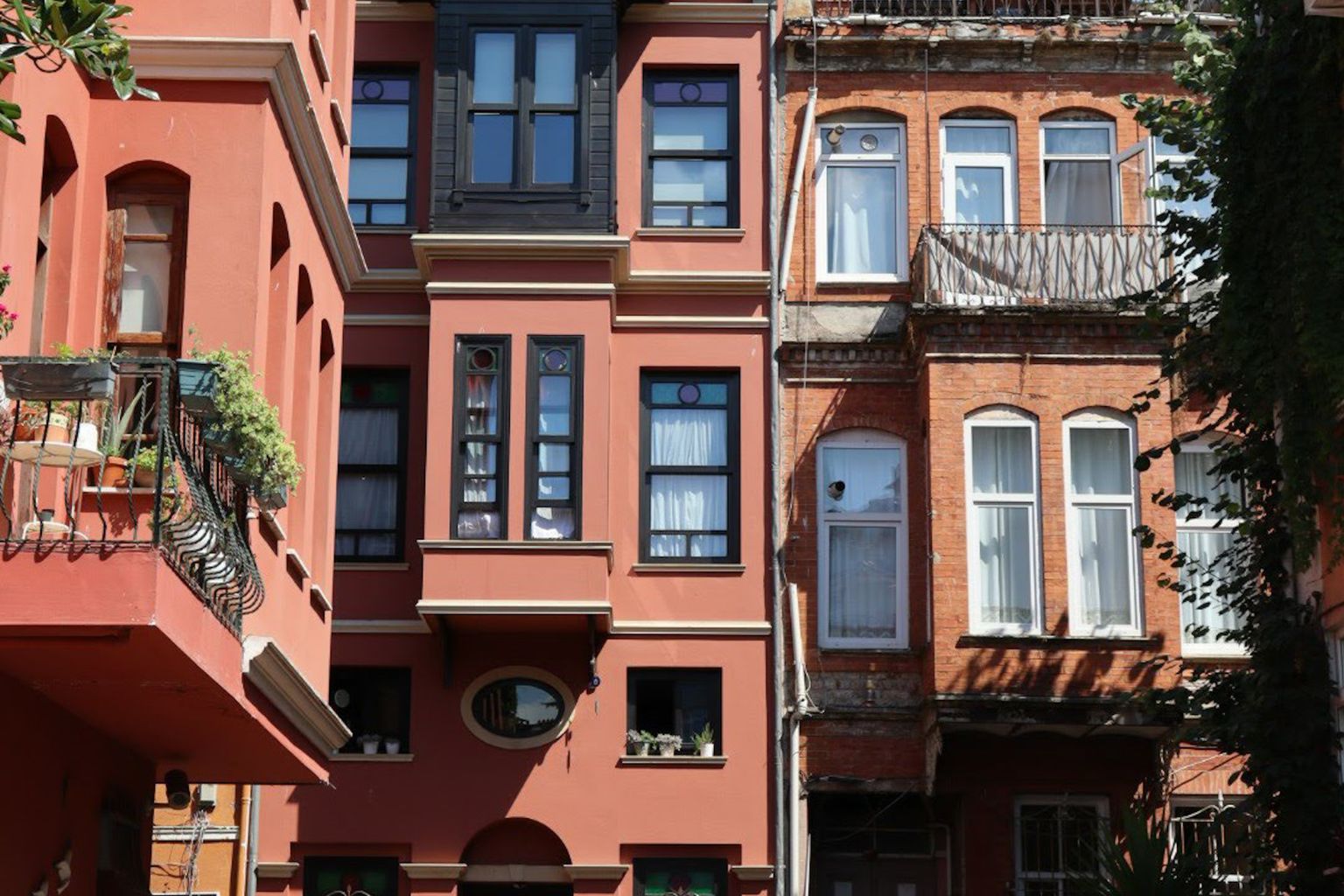Two neighbouring townhouses side by side, each with its own front door